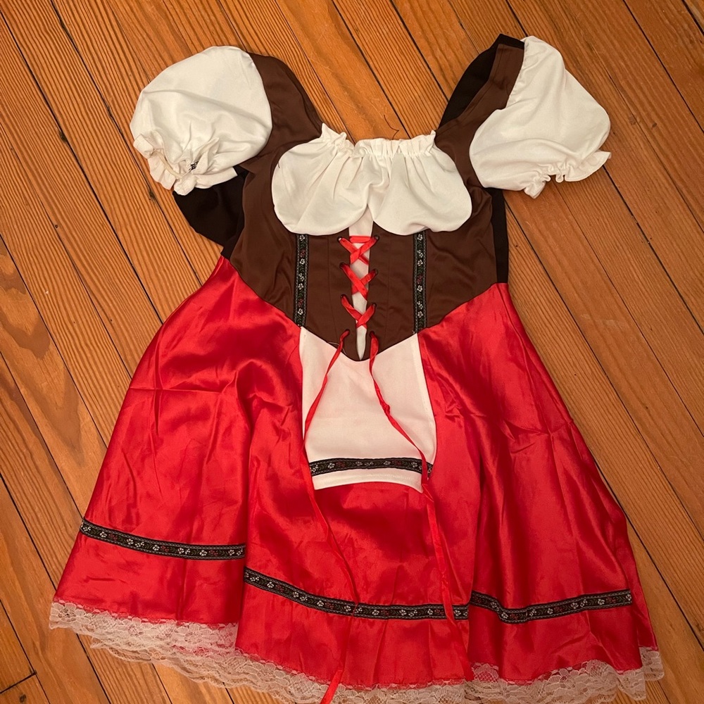 German girl dirndl for Oktoberfest or Halloween